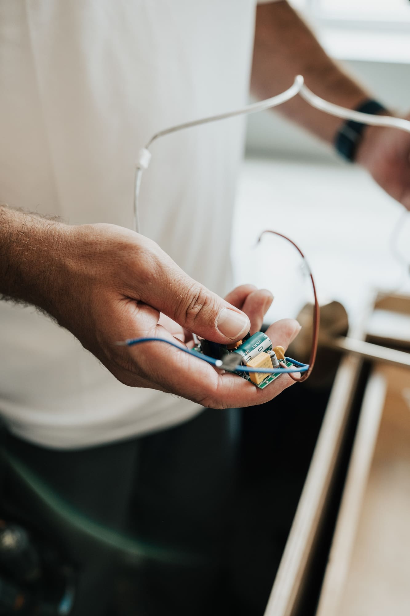 Repairing the wiring connections behind a ceiling light fixture