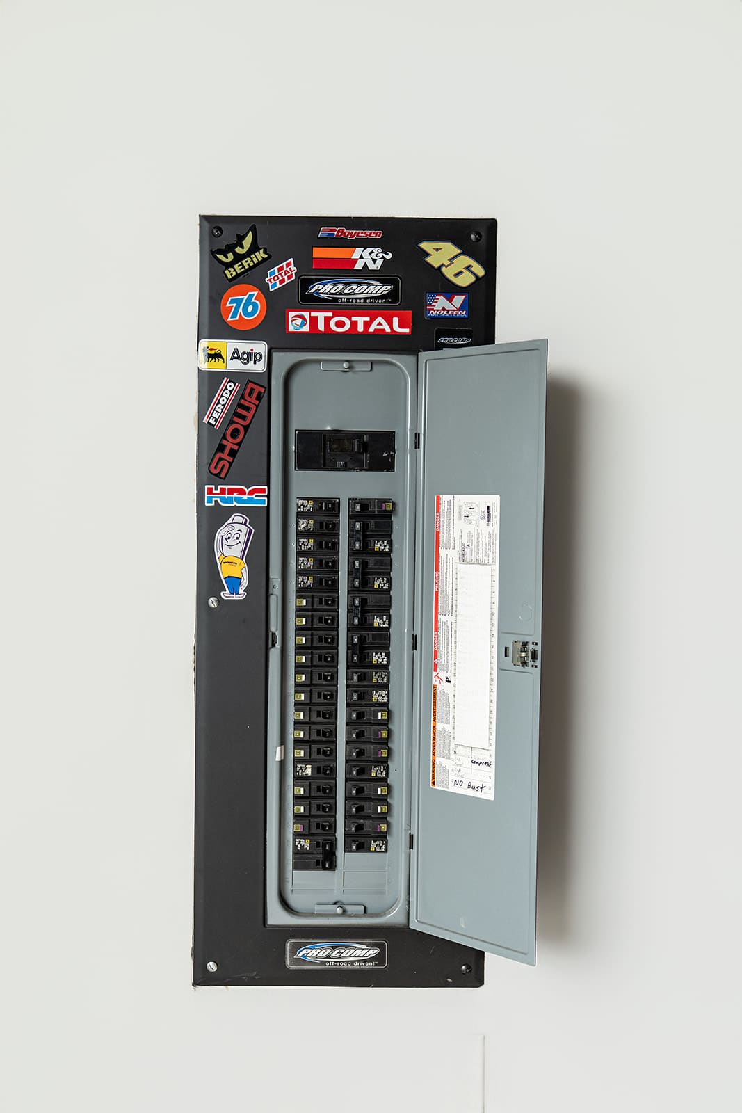 A residential breaker panel with the cover off during service work